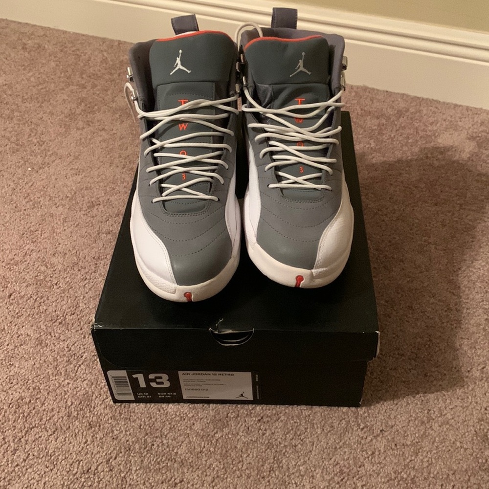 Retro 12 product number 130690 012. Good condition shoes. Gray white n orange.